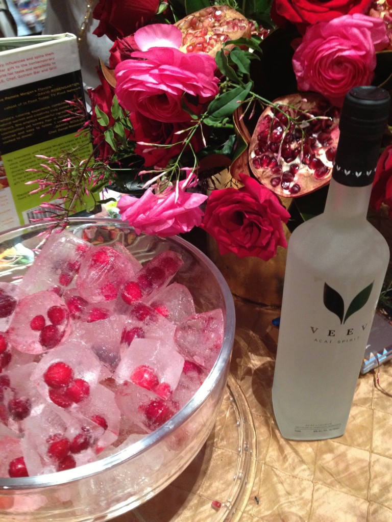 Fruzen Ice cubes and VeeV Acai Spirits in our Pom Passion Cocktail 